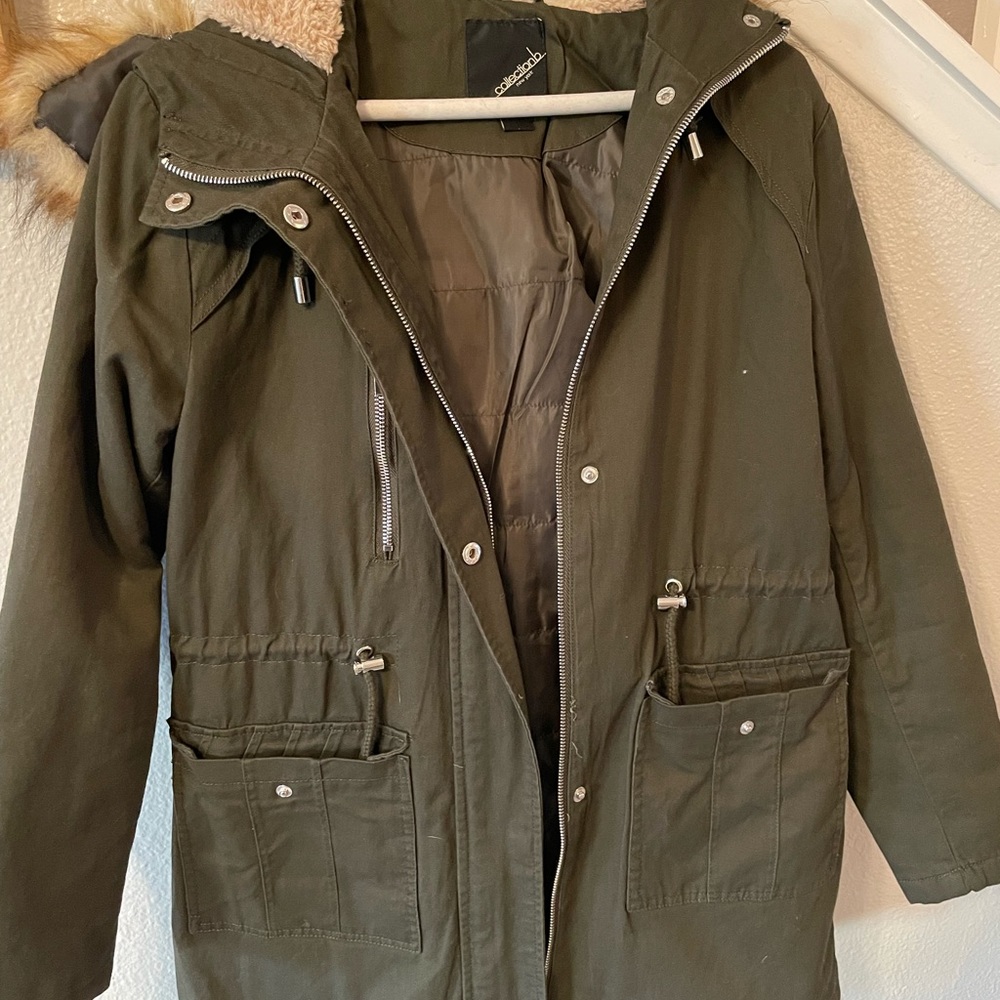 Light fall/California winter jacket with hood. Like new